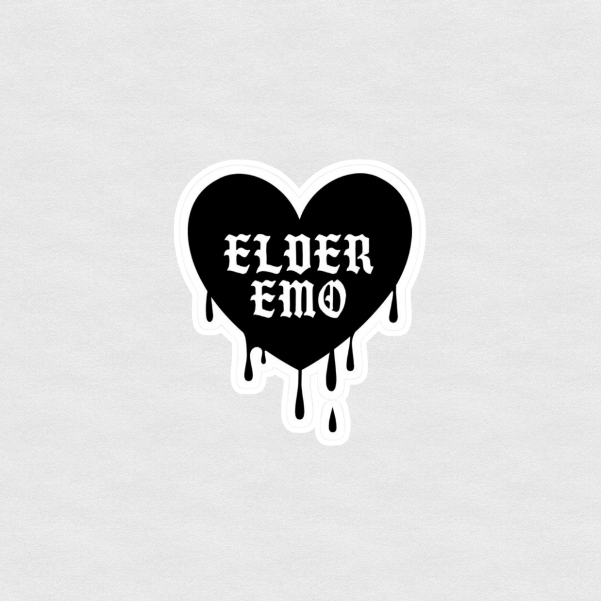 Black dripping heart sticker with white gothic text reading “Elder emo”
