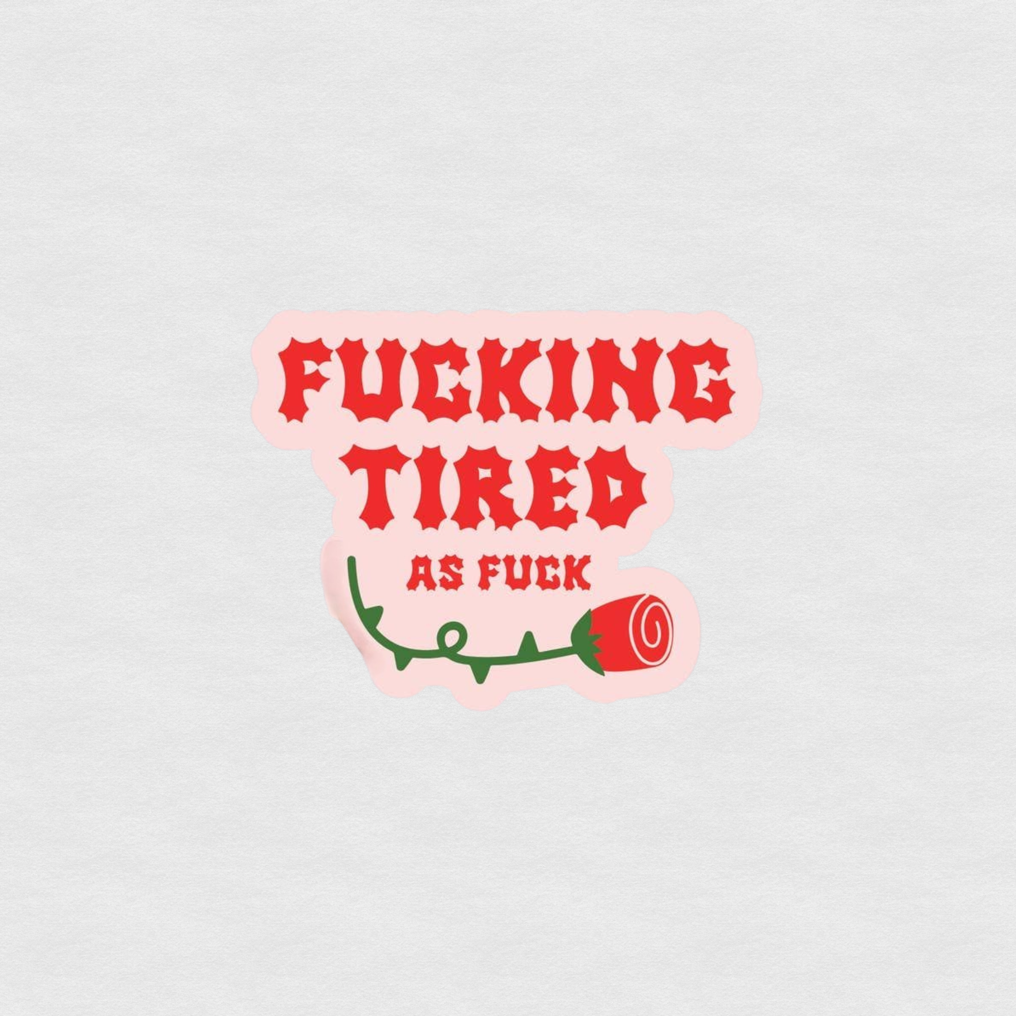 Red gothic text sticker reading “Fucking tired as fuck” with a stylized rose graphic
