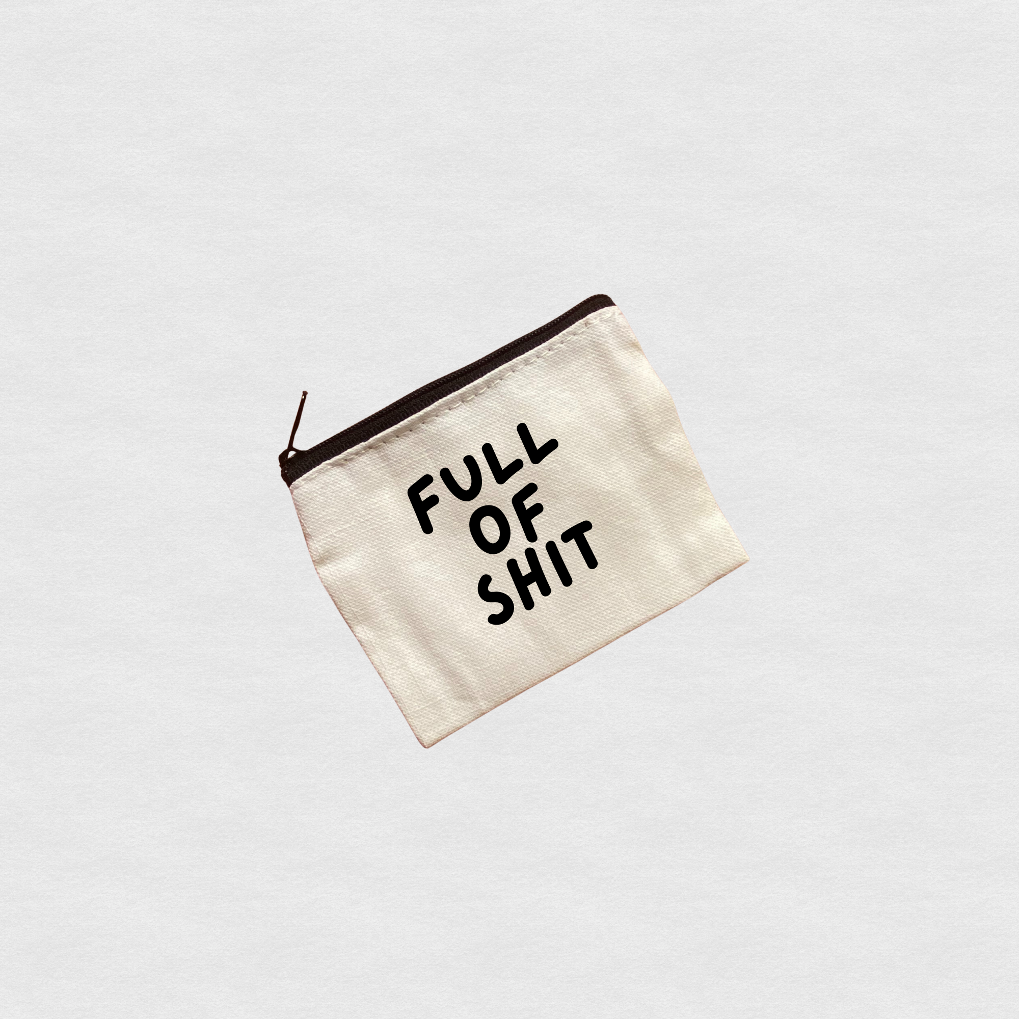 Canvas zipper pouch with “Full of Shit” text design
