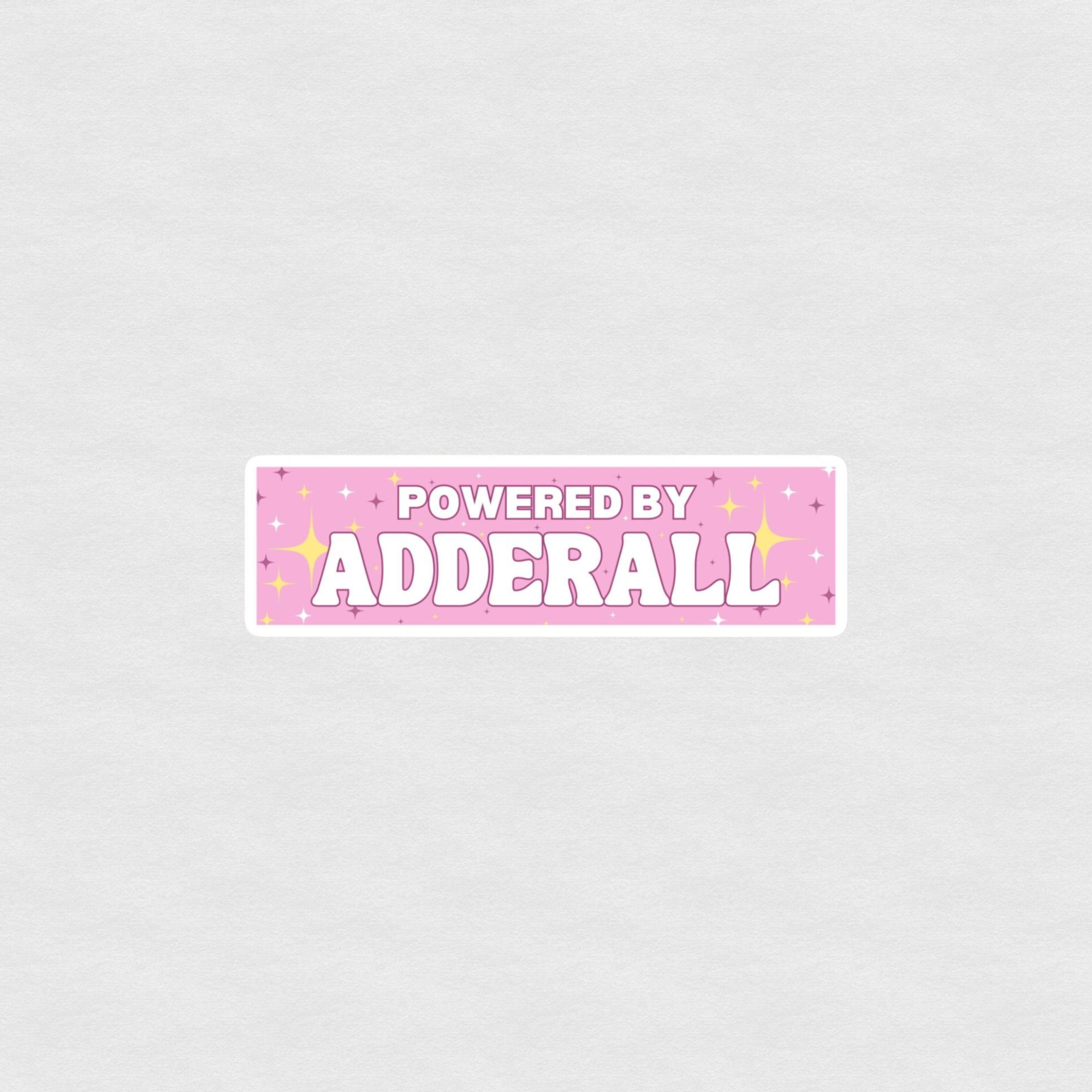 Pink “Powered by Adderall” sticker with sparkles and bold playful lettering