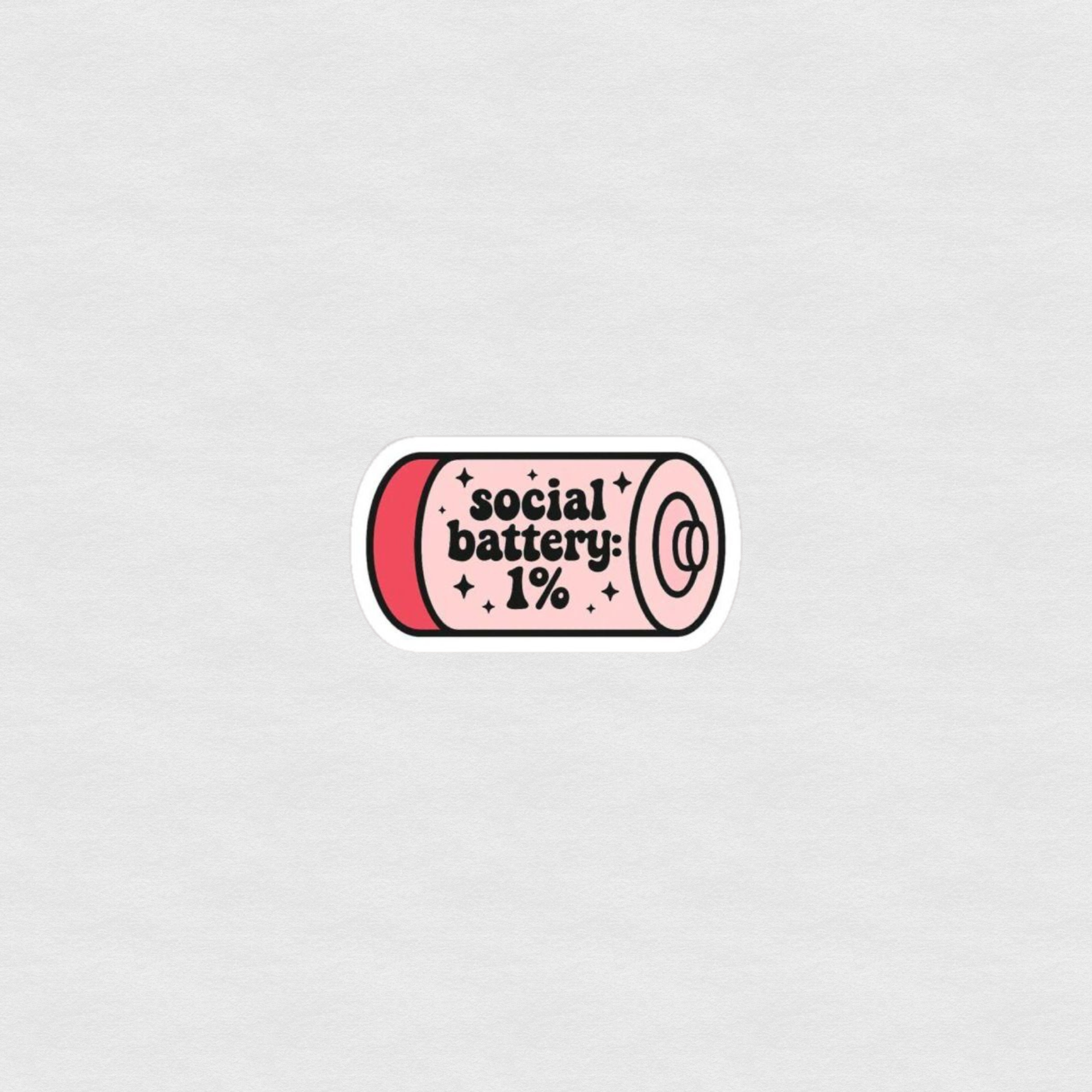 Cartoon battery sticker reading “Social battery 1%” in pink and red tones
